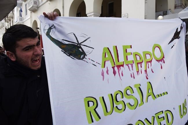 Syrian refugees protest at Russian consulate in Greek city | iNFOnews.ca