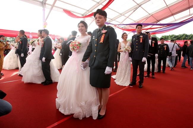 Two same-sex couples in military marry in first for Taiwan | iNFOnews.ca