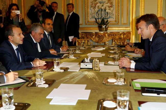 Resigned PM tells Lebanese to 'chill,' says he's coming home | iNFOnews.ca
