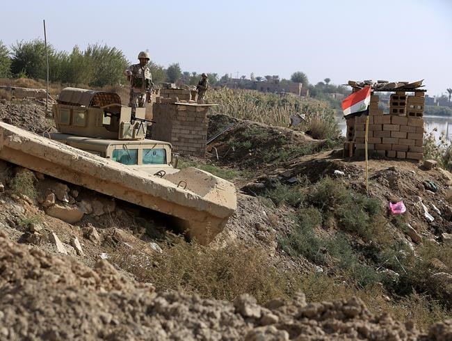 Iraqi town fearful as battle against IS rages next door | iNFOnews.ca Iraqi town fearful as battle against IS rages next door | iNFOnews.ca