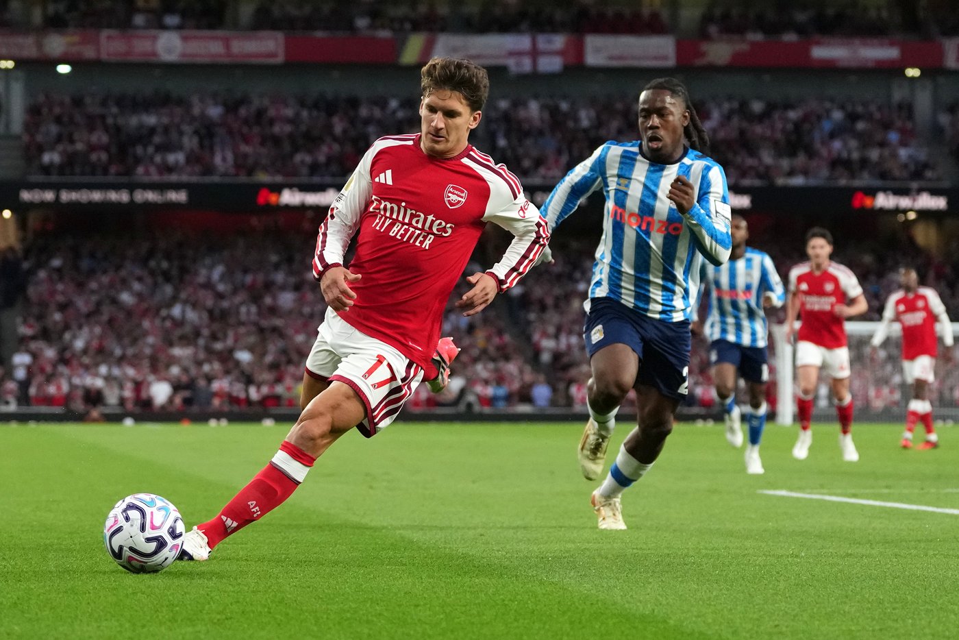 Tzolis shines as Arsenal opens Premier League season by sweeping aside promoted Coventry | iNFOnews.ca
