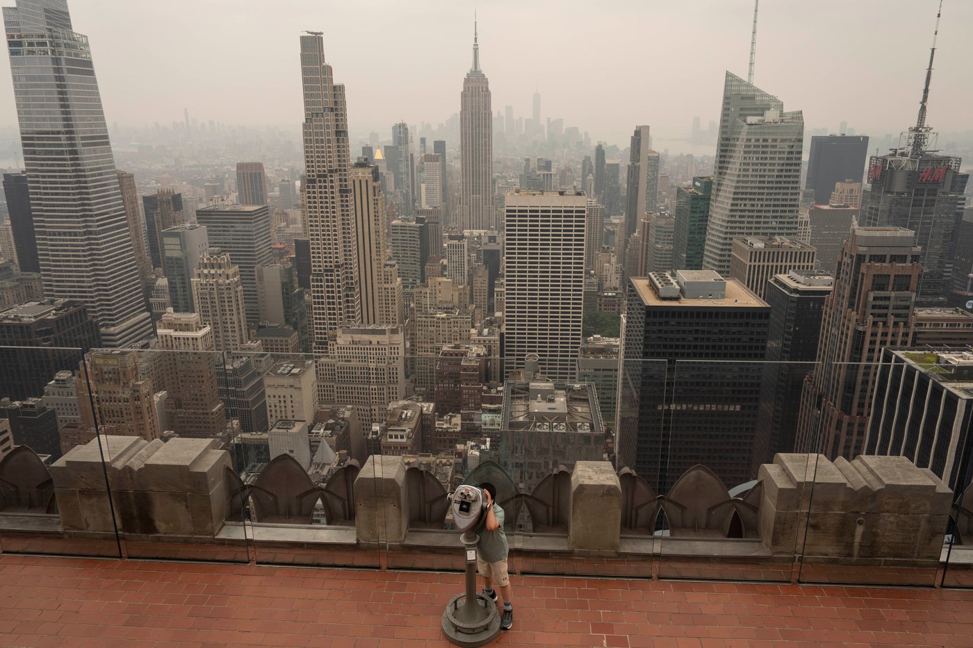 Heavy smoke from wildfires is darkening skies from the US Midwest to the East Coast, in photos | iNFOnews.ca