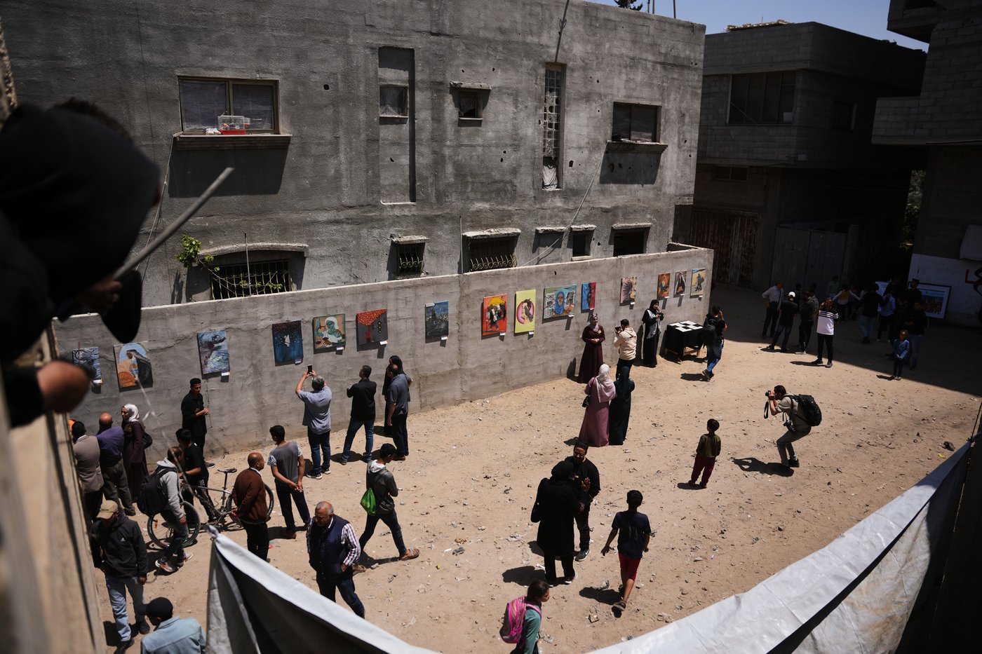 Young Palestinian artists in Gaza exhibit their impressions of war as a fragile ceasefire holds | iNFOnews.ca Young Palestinian artists in Gaza exhibit their impressions of war as a fragile ceasefire holds | iNFOnews.ca