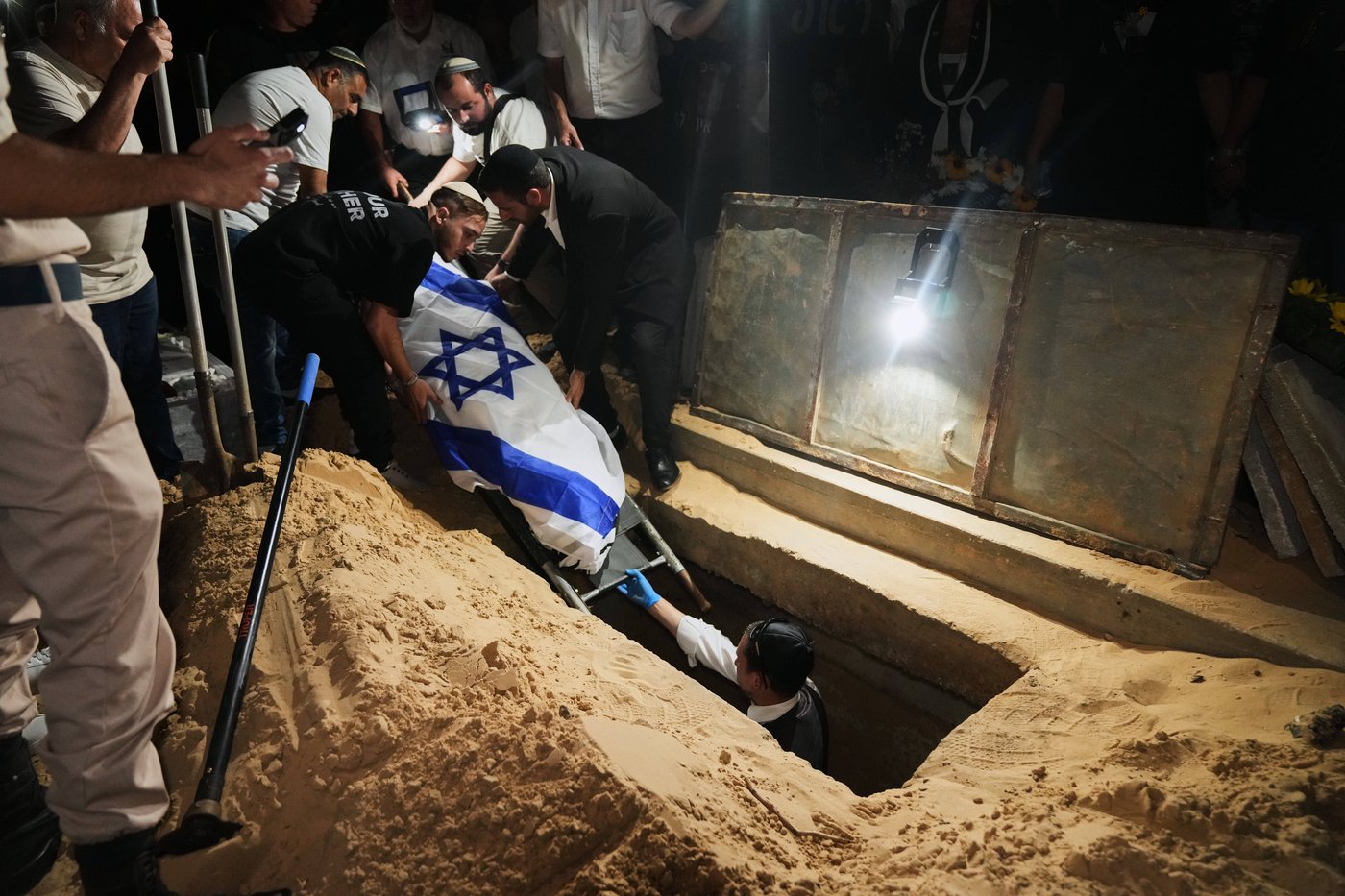 The Latest: Israel identifies remains of 2 more hostages | iNFOnews.ca