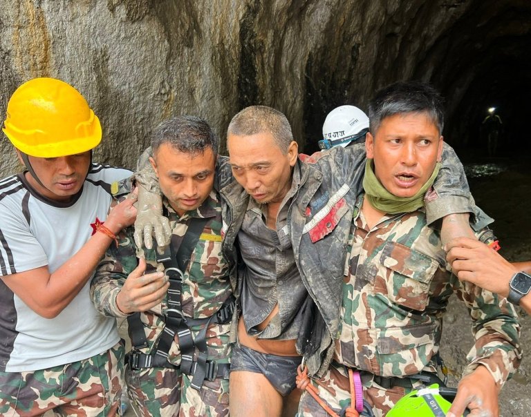 Rescuers in Nepal pull a Chinese national and a woman alive 10 days after devastating floods | iNFOnews.ca