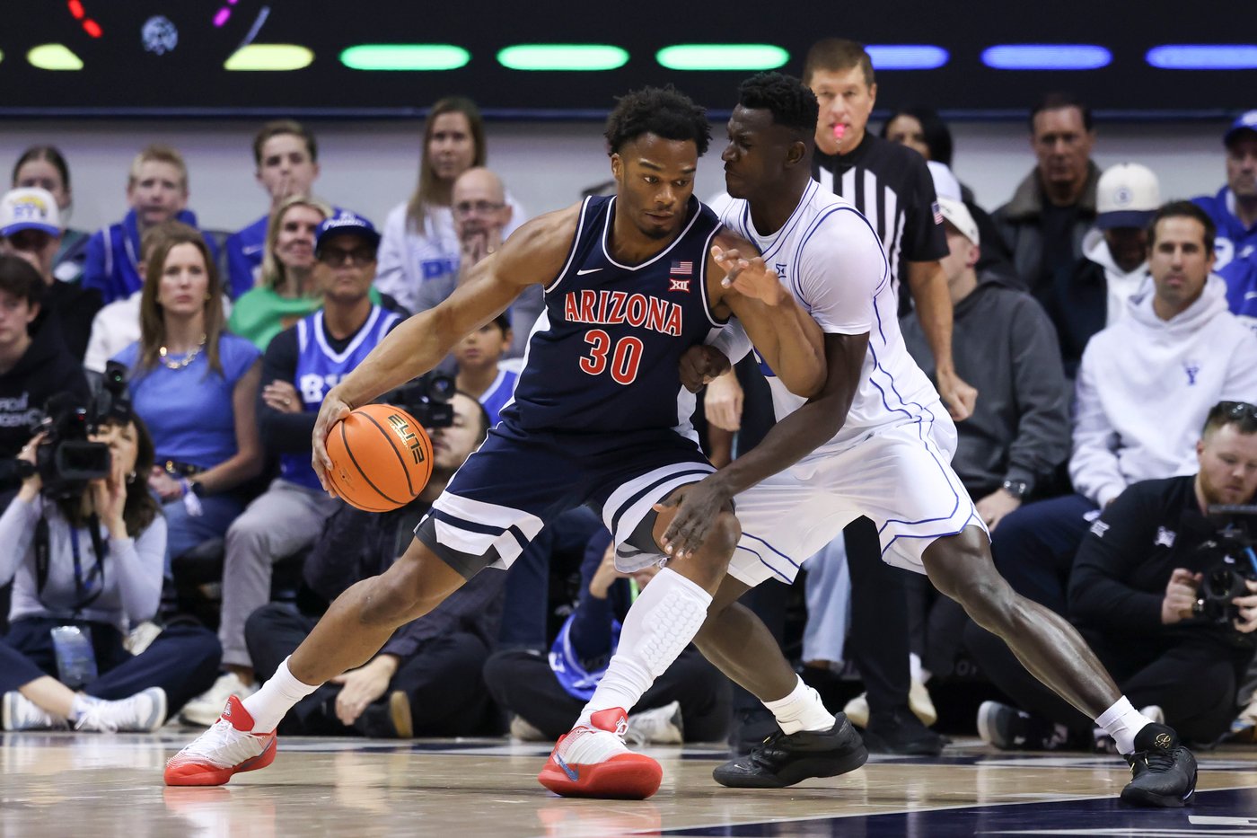 Top-ranked Arizona withstands late rally by No. 13 BYU to remain unbeaten with 86-83 win | iNFOnews.ca