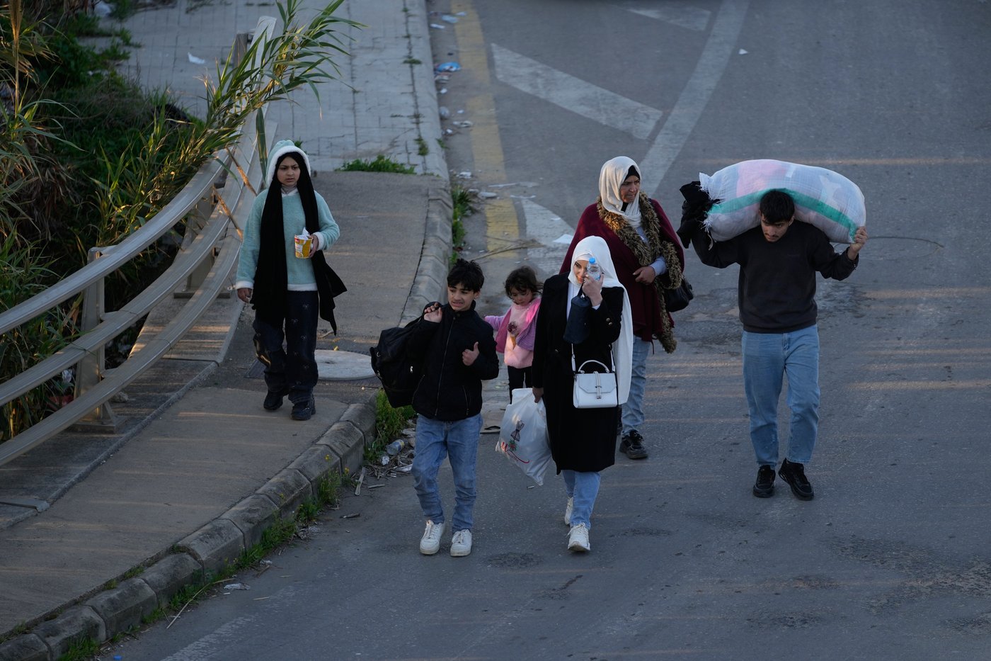 Photos show Lebanese people fleeing and buildings wrecked after Israeli strikes | iNFOnews.ca