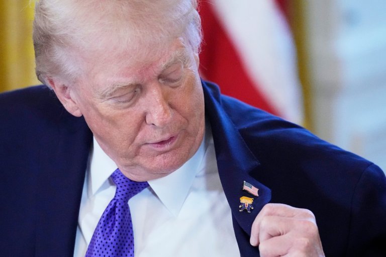 Trump wears a new 'Happy Trump' lapel pin, but insists he's never happy | iNFOnews.ca