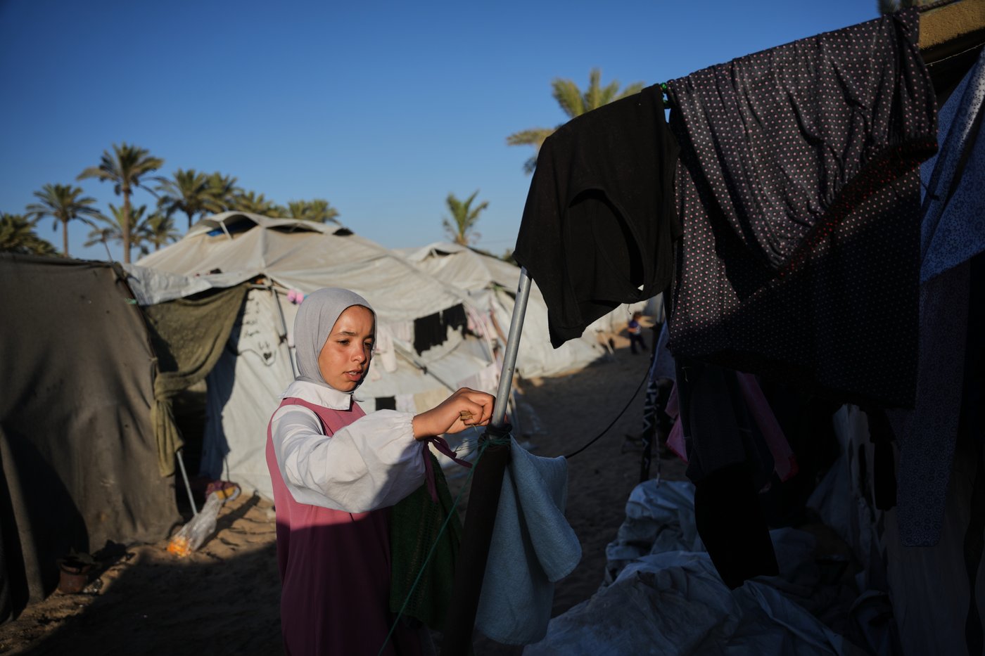 PHOTO ESSAY: In Gaza, orphaned children navigate grief while trying to hold on to childhood | iNFOnews.ca