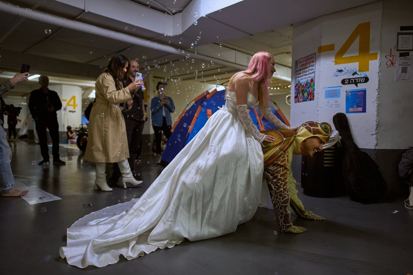 PHOTO ESSAY: Life goes on underground in Israel, in scenes both real and surreal | iNFOnews.ca