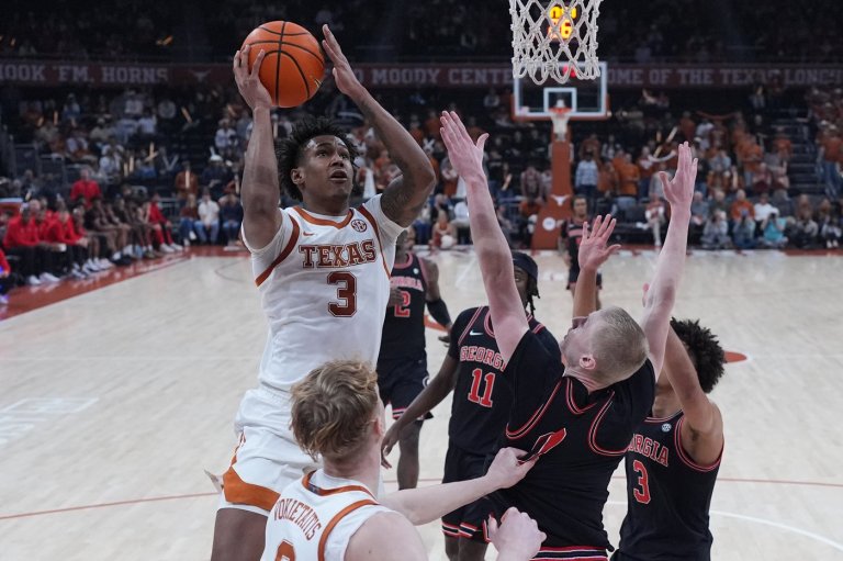 Texas rallies to beat No. 21 Georgia 87-67 behind Swain's 26 points | iNFOnews.ca