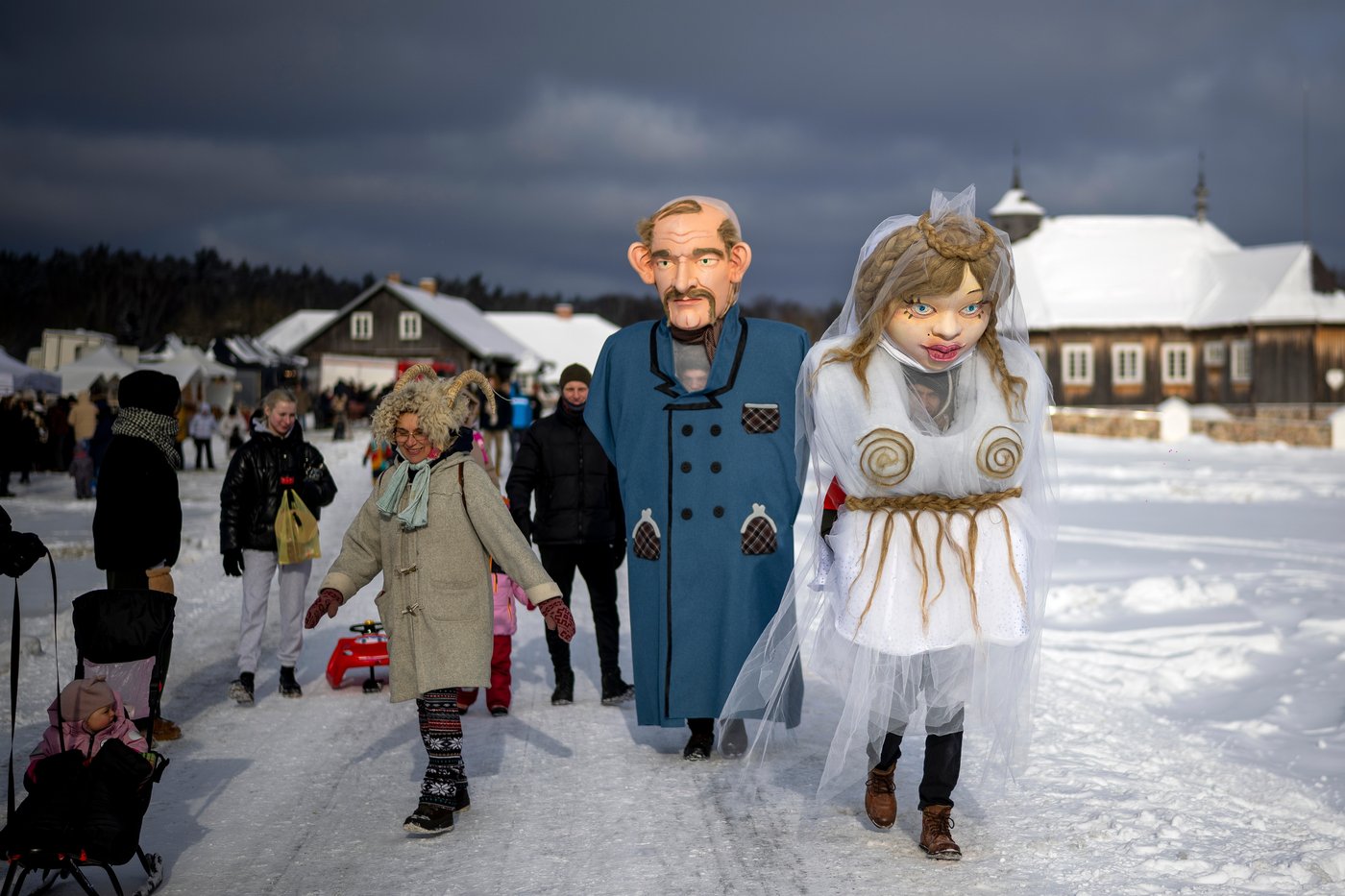 Photos show masked revelers celebrating Shrovetide in Lithuania | iNFOnews.ca