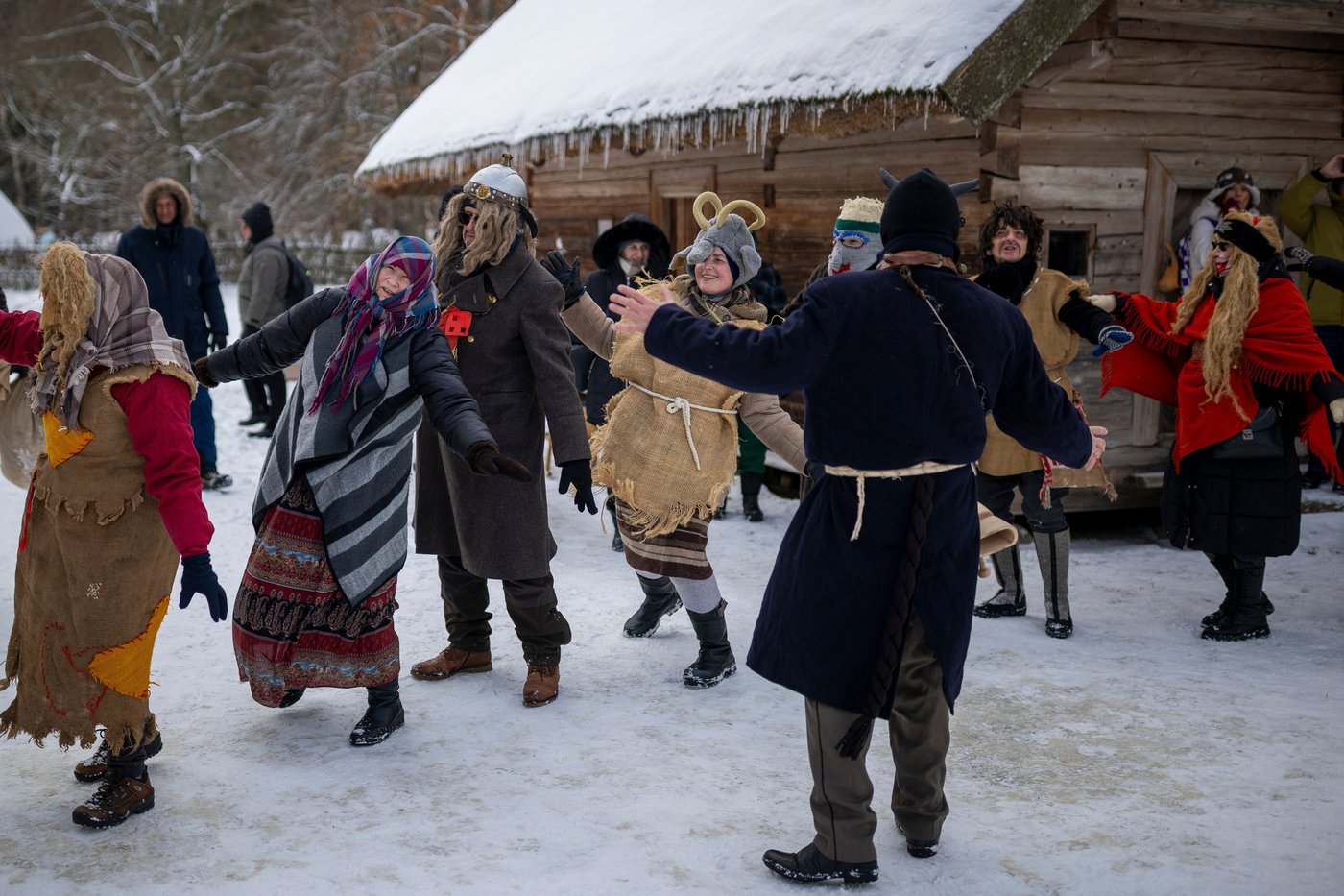 Photos show masked revelers celebrating Shrovetide in Lithuania | iNFOnews.ca