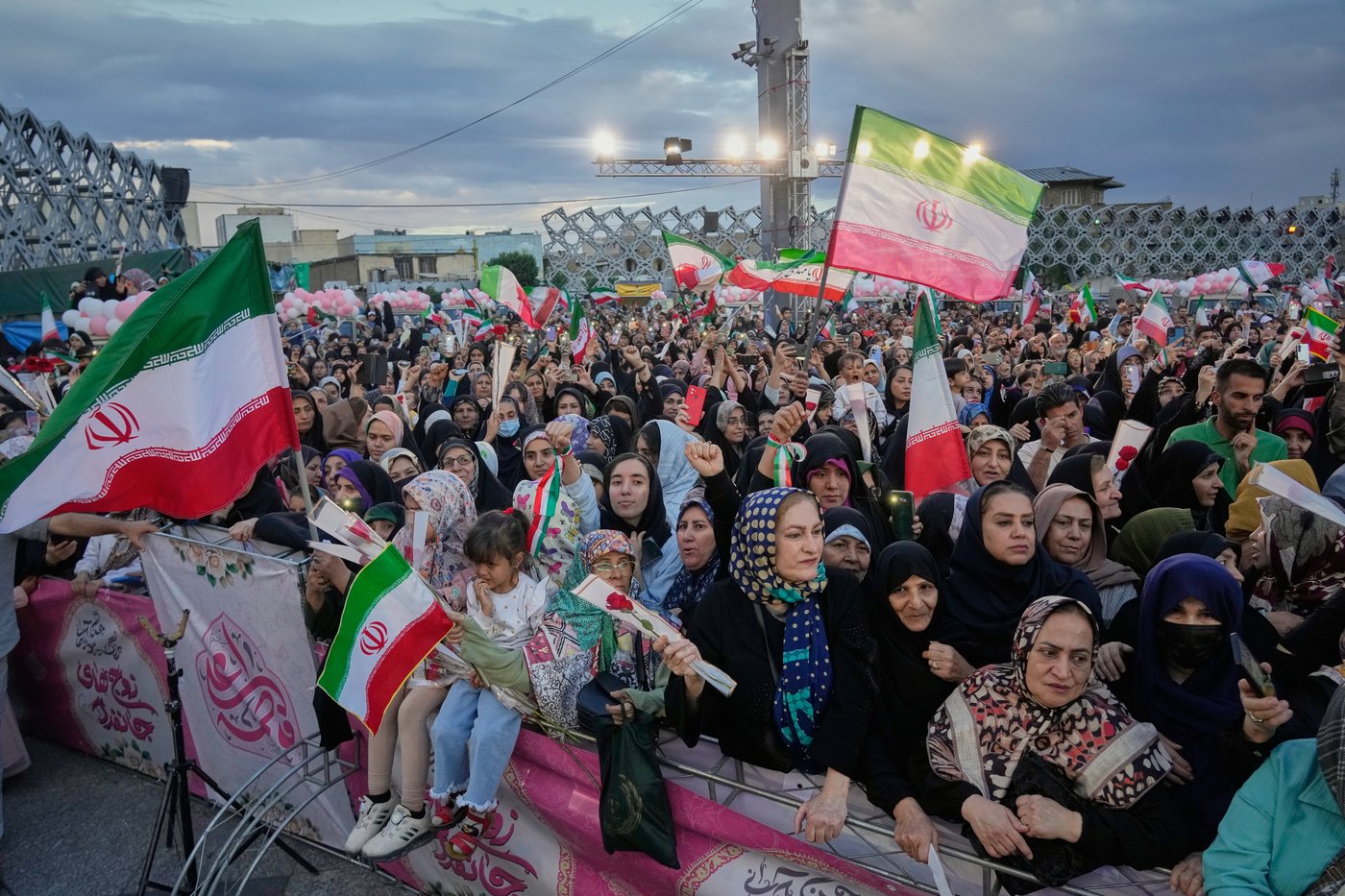 Photos of a mass wedding and a colorful missile at Tehran's 'Sacrifice for Iran' ceremony | iNFOnews.ca