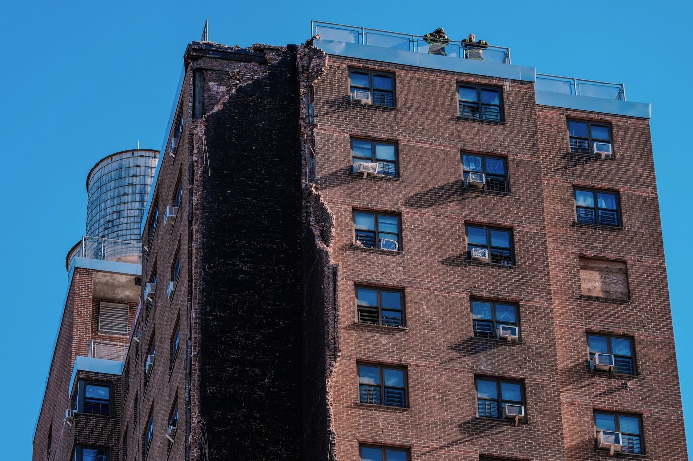 Residents of a NYC public housing tower escape unharmed after a massive chimney collapses | iNFOnews.ca