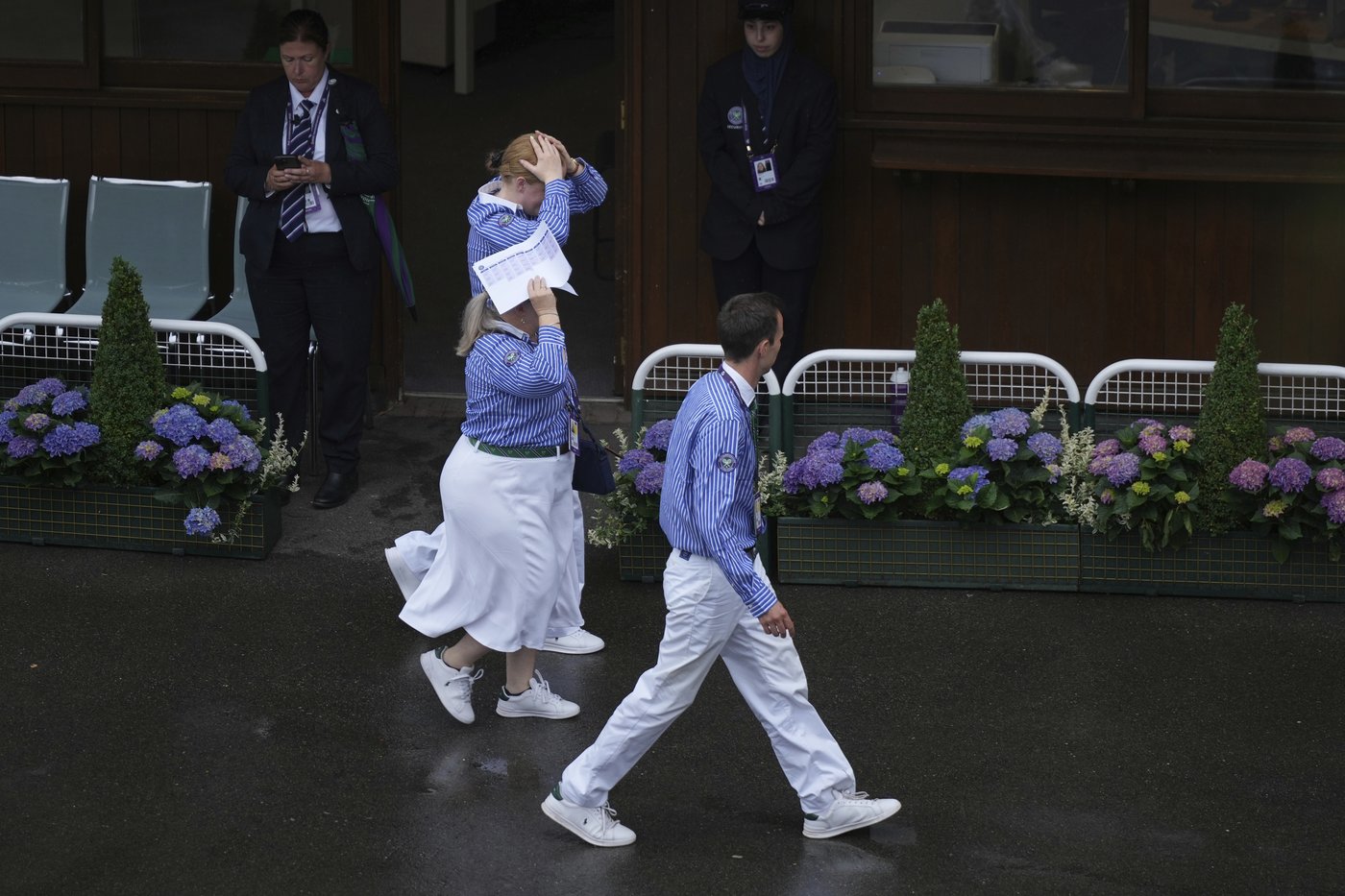 Photos show the rain on Day 3 after the Wimbledon heatwave | iNFOnews.ca