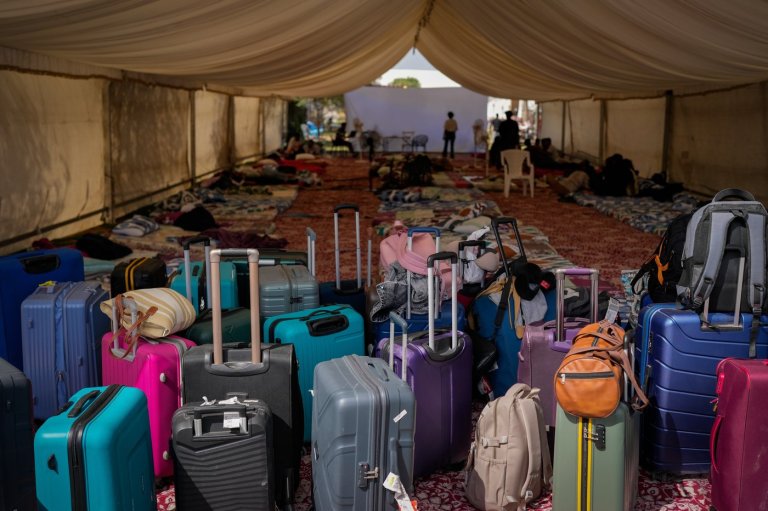 Photos show travellers stuck in the UAE taking shelter from war at Indian expat's home | iNFOnews.ca