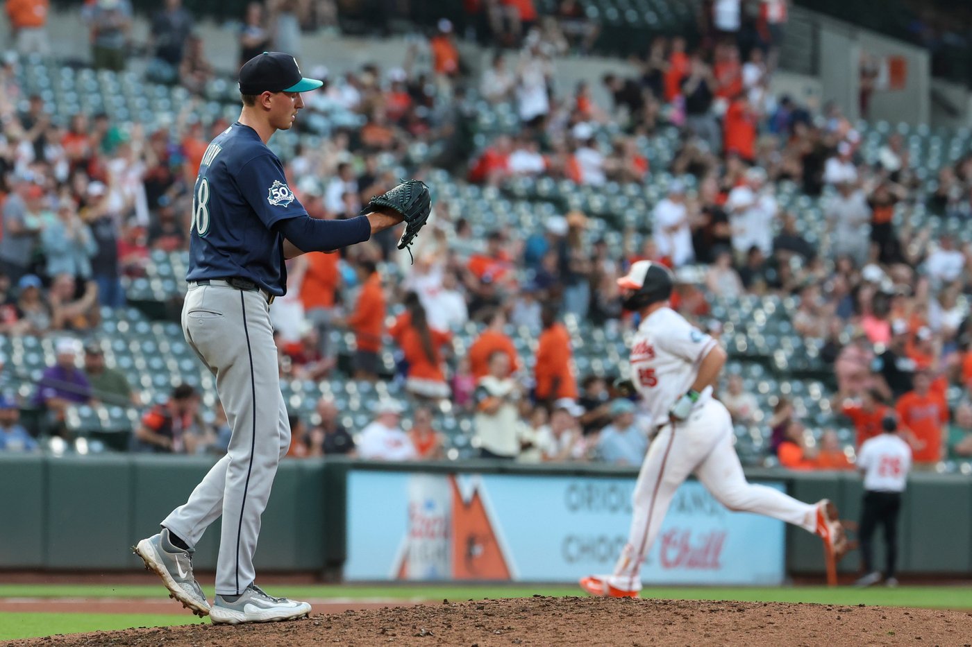 Holliday hits grand slam and Young pitches Orioles past Mariners 7-2 to stop 4-game slide | iNFOnews.ca