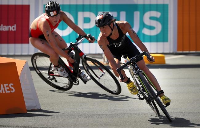 New Zealand holds on to deny Canada bronze in Commonwealth Games team triathlon | iNFOnews.ca