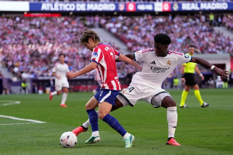 Atletico Madrid beats 10-man Real Madrid 2-1 in derby, Man City outlasts Sunderland in England | iNFOnews.ca
