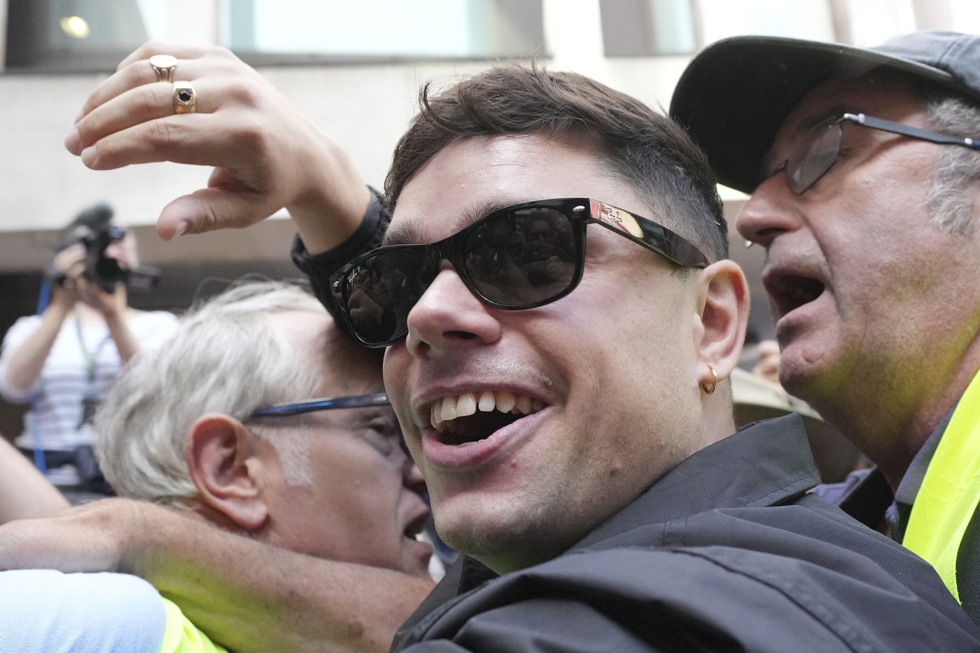 Fans of Irish band Kneecap surround a London court as rapper Mo Chara faces a terror-related charge | iNFOnews.ca