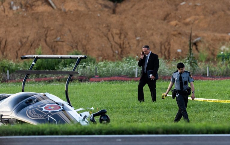 Investigators probe a dramatic midair crash as a landing plane hits hovering police helicopter | iNFOnews.ca