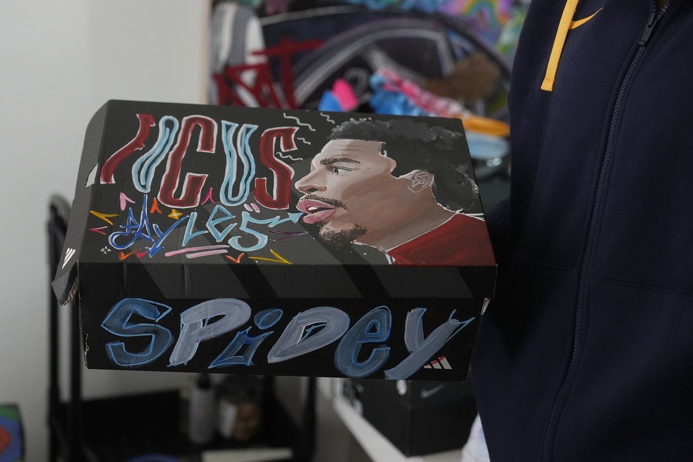 Cal guard Jayda Noble paints custom shoes to express her artistic side when she leaves the court | iNFOnews.ca