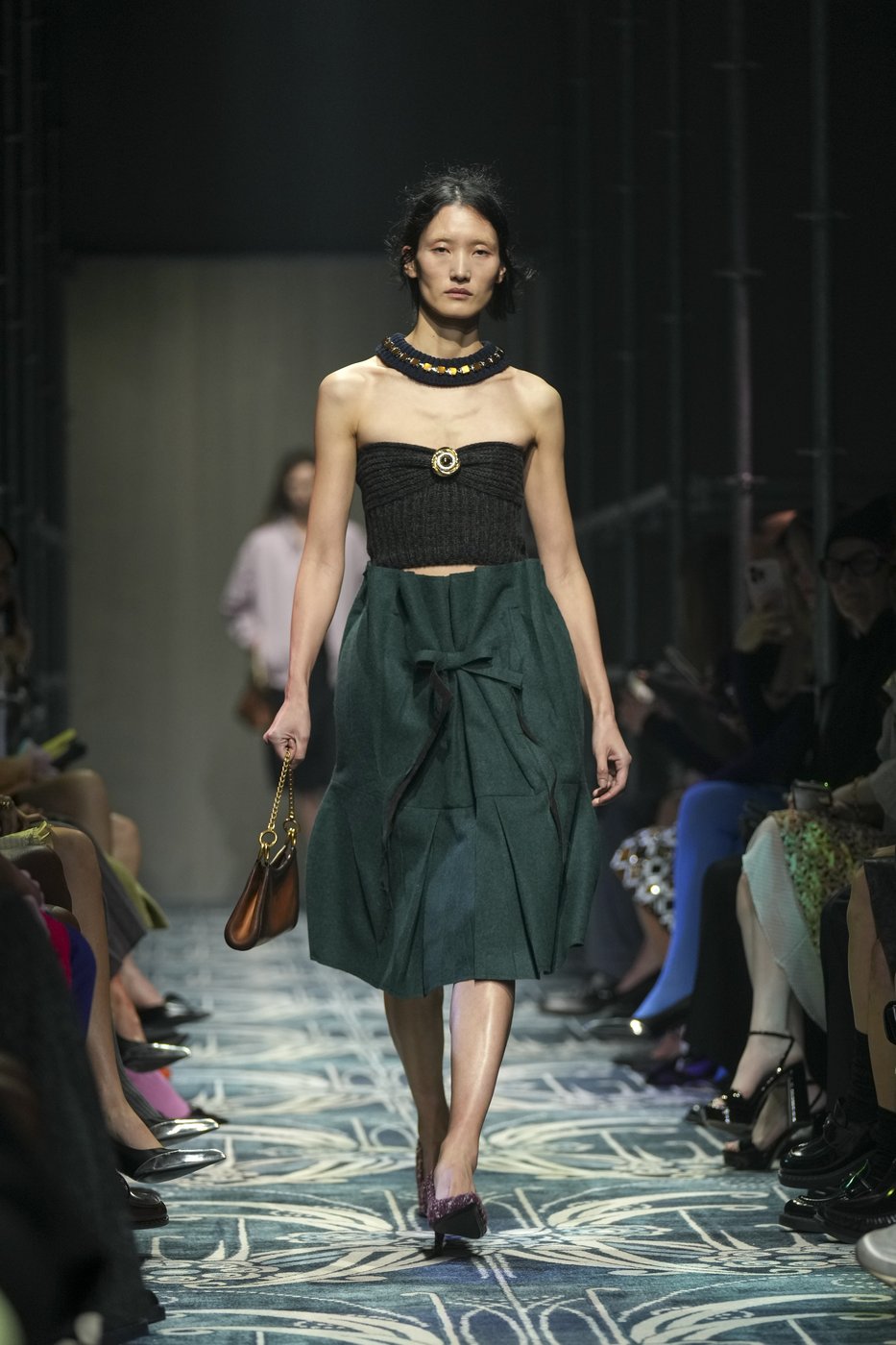 Prada reconstructs femininity starting with the little black dress fit to dark times | iNFOnews.ca