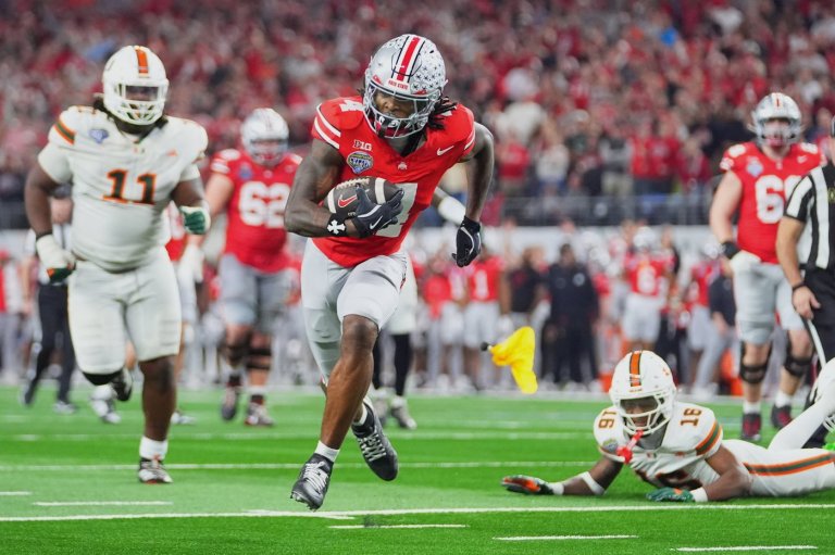 Defending champ Ohio State loses to Miami as teams with first-round byes drop to 0-5 in playoff | iNFOnews.ca