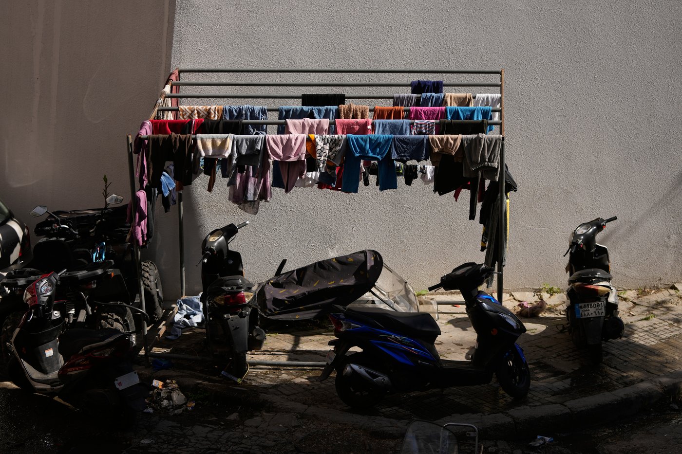 Photos of displaced civilians in Lebanon, where schools and stadiums turn into shelters during war | iNFOnews.ca
