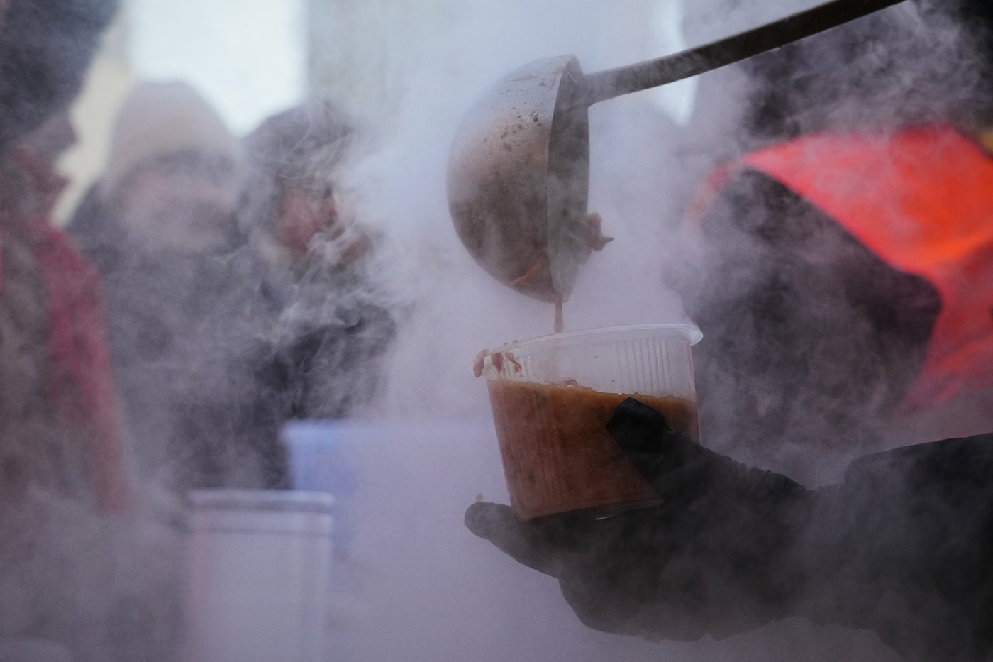 Photos show Ukrainians enduring a frigid winter after Russian strikes knocked out power | iNFOnews.ca