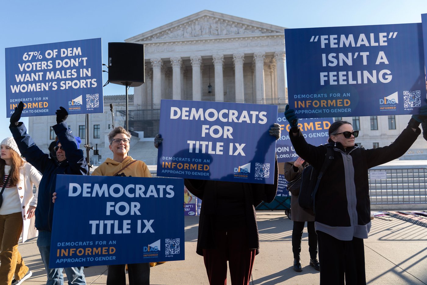 Photos of demonstrators outside the Supreme Court as it considers upholding transgender sports bans | iNFOnews.ca