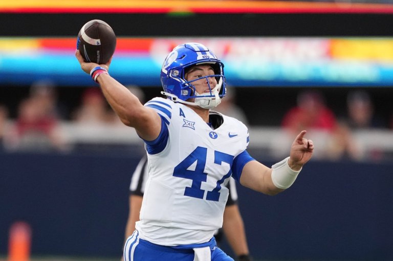 Bachmeier runs for 7-yard TD in second OT, No. 18 BYU beats Arizona 33-27 to stay undefeated | iNFOnews.ca