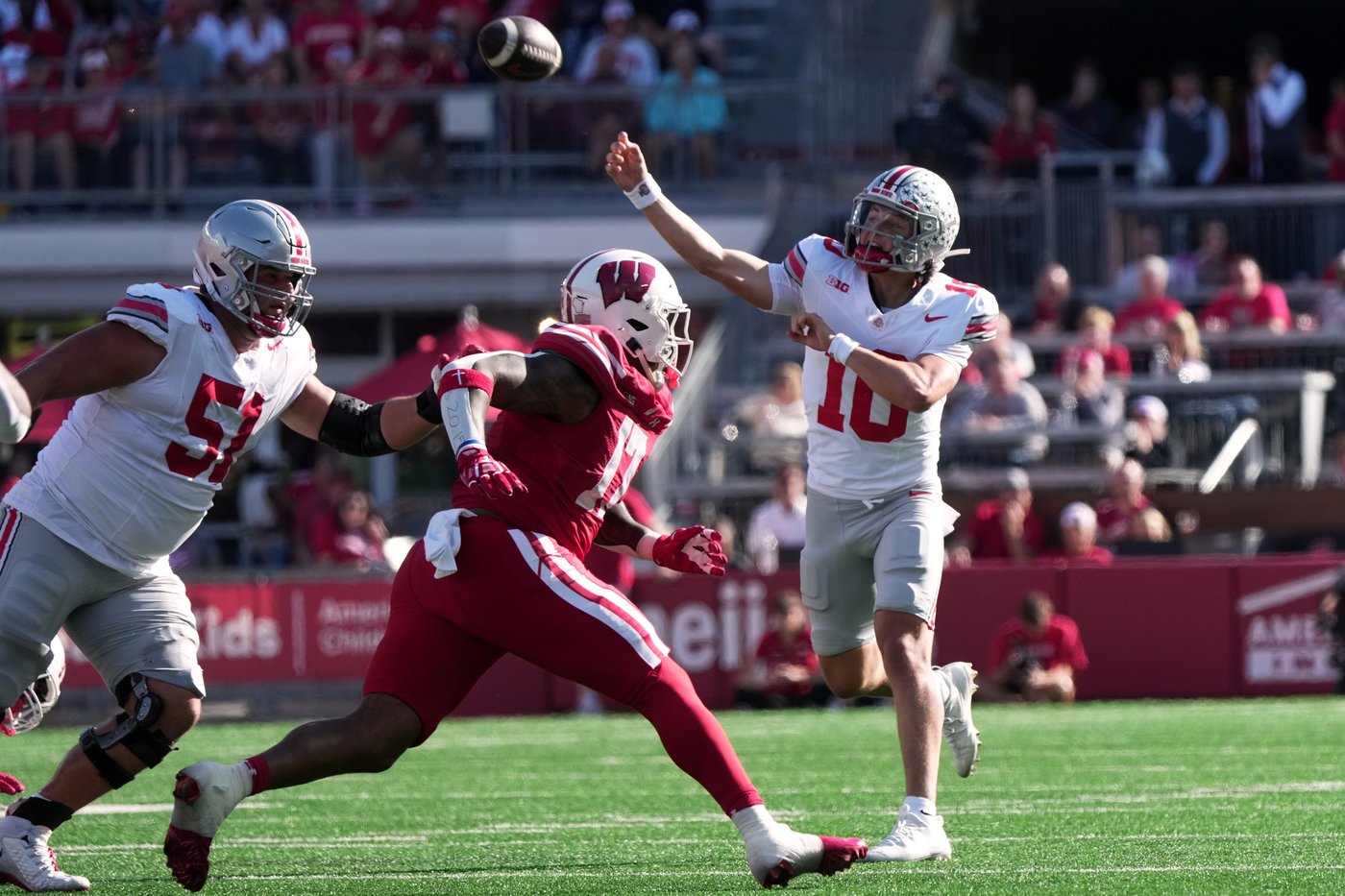 Sayin throws 4 TD passes as No. 1 Ohio State throttles Wisconsin 34-0 | iNFOnews.ca