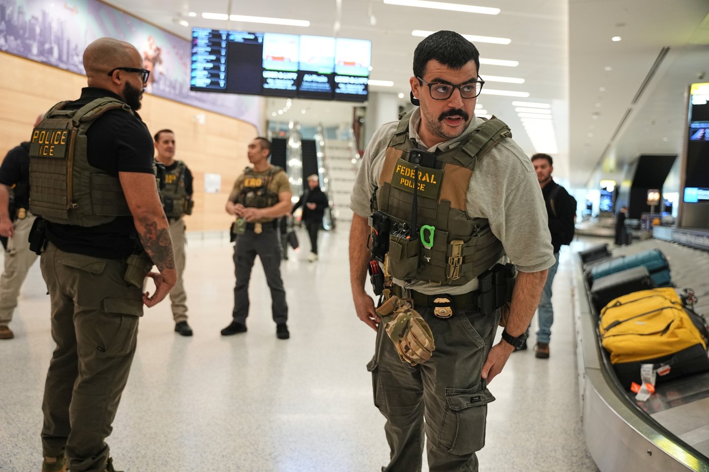 Photos show ICE agents at US airports where the partial government shutdown triggered delays | iNFOnews.ca