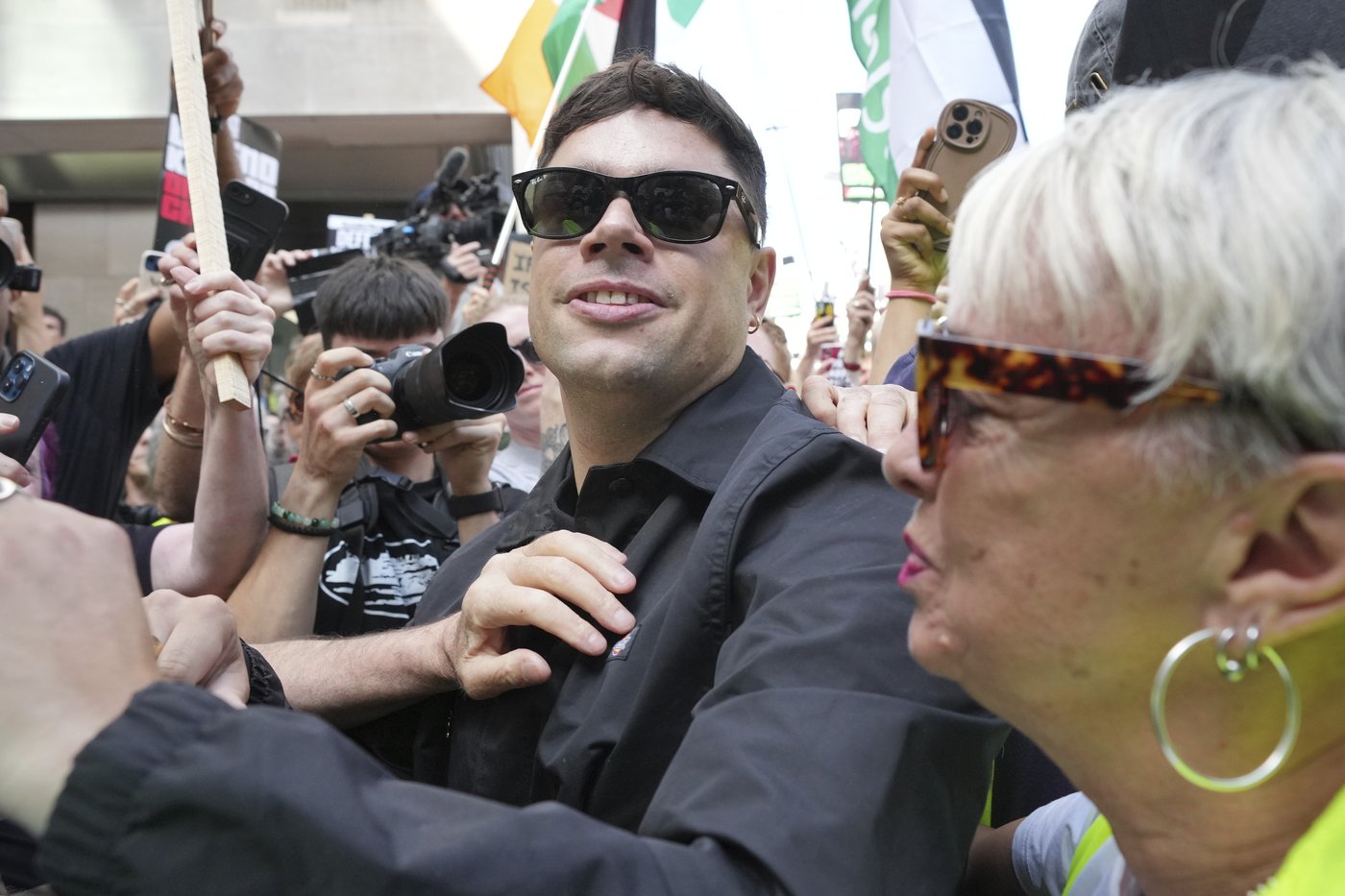 Fans of Irish band Kneecap surround a London court as rapper Mo Chara faces a terror-related charge | iNFOnews.ca