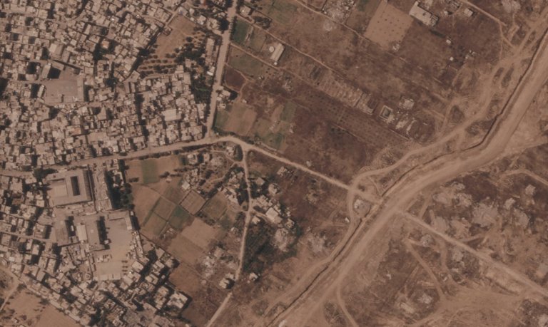 Israel is building a miles-long earthen barrier inside Gaza, entrenching its division | iNFOnews.ca