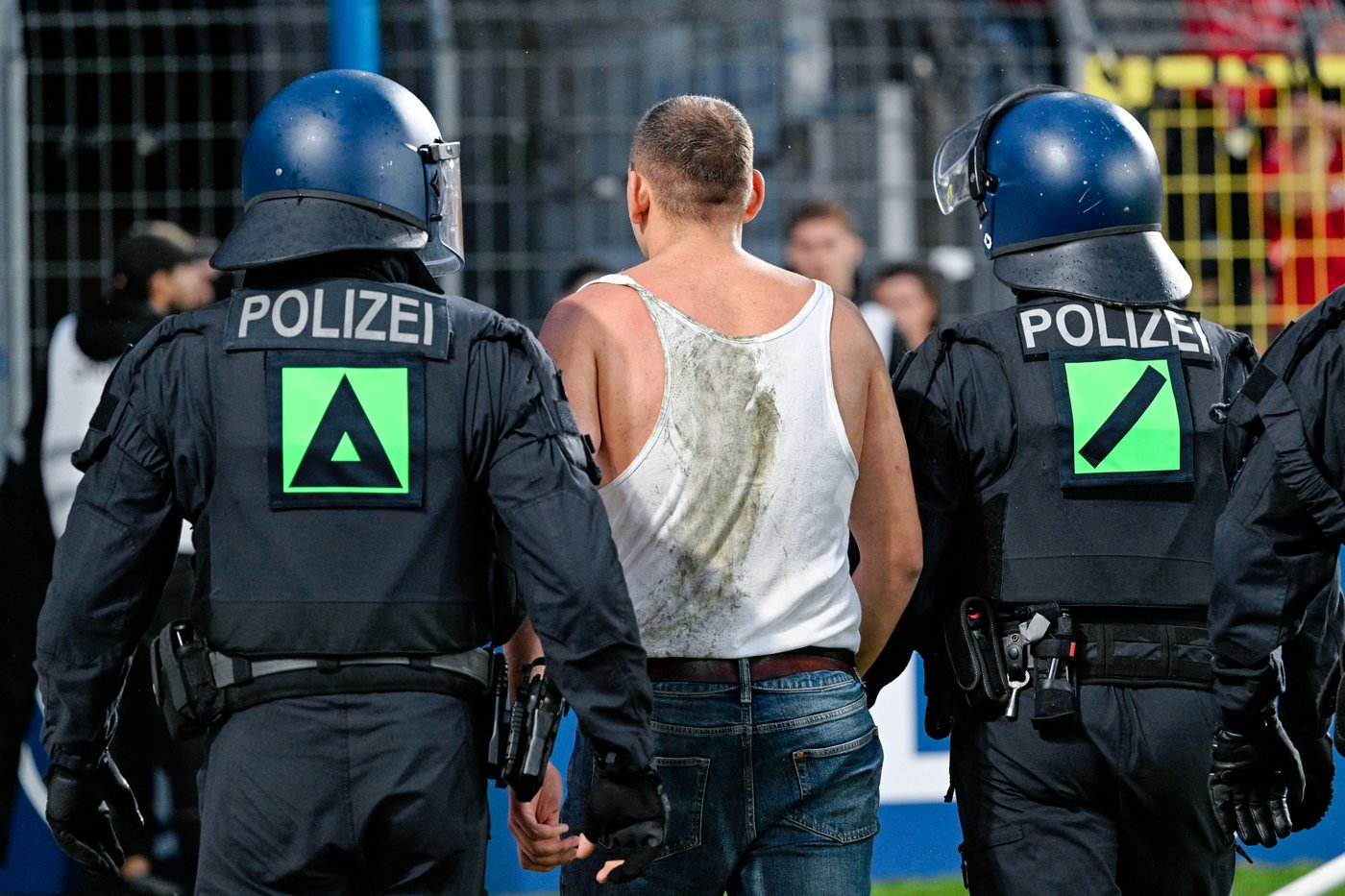 German Cup match marred by fireworks, pitch invasion | iNFOnews.ca German Cup match marred by fireworks, pitch invasion | iNFOnews.ca