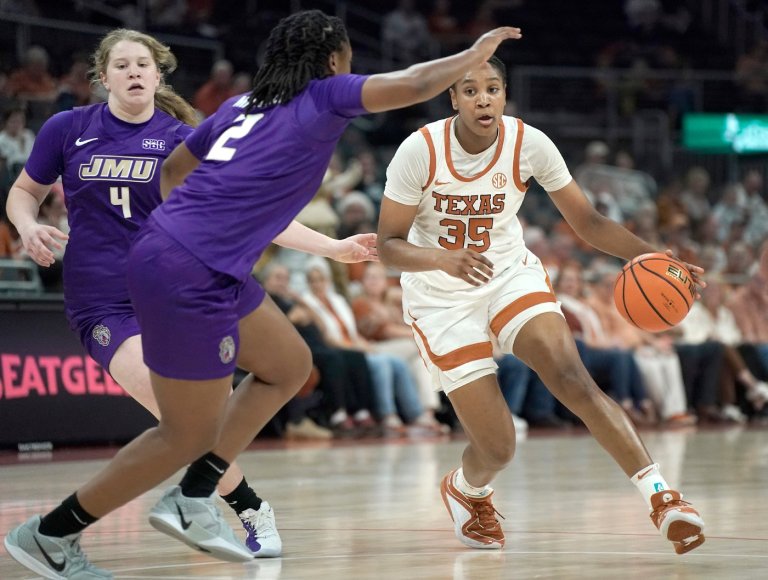 Booker's all-around performance leads No. 4 Texas to a 95-56 win against James Madison | iNFOnews.ca