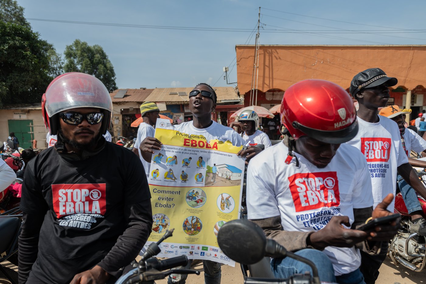 Motorcycle taxi drivers in Congo rally for Ebola awareness as attacks hinder response | iNFOnews.ca