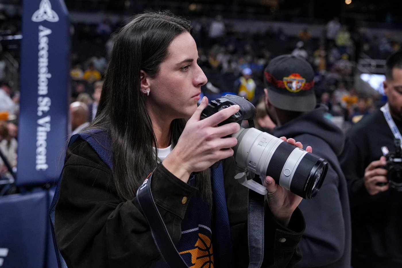 Caitlin Clark works as a photographer for the Indiana Pacers as they host LeBron and the Lakers | iNFOnews.ca