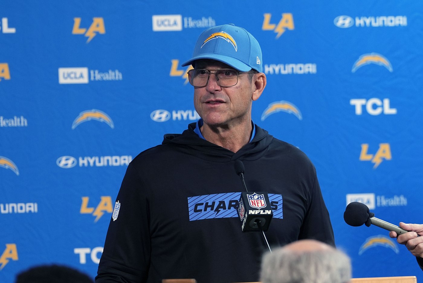 Jim Harbaugh misses part of Chargers' win over Broncos for treatment of irregular heartbeat | iNFOnews.ca