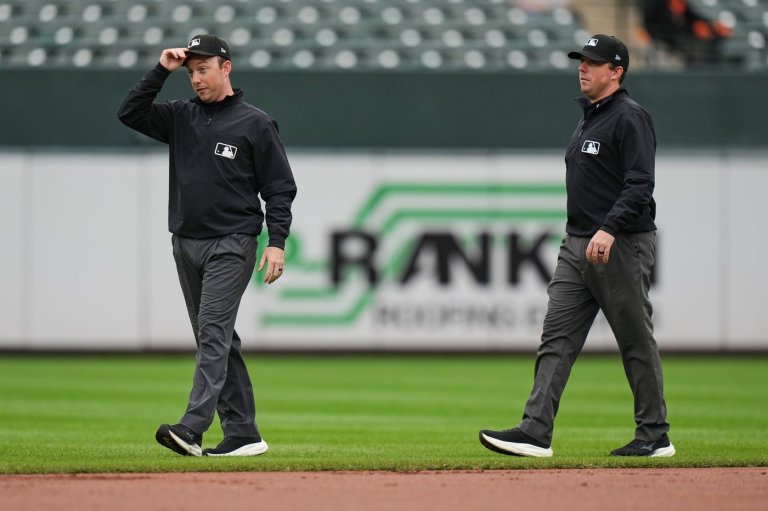 Twin brothers Austin and Tyler Jones ump a big league game together for the first time | iNFOnews.ca
