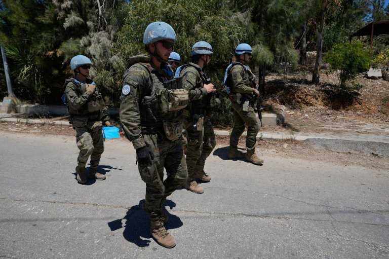 Photos show Lebanese and UN troops take positions in a village vacated by Israeli soldiers | iNFOnews.ca