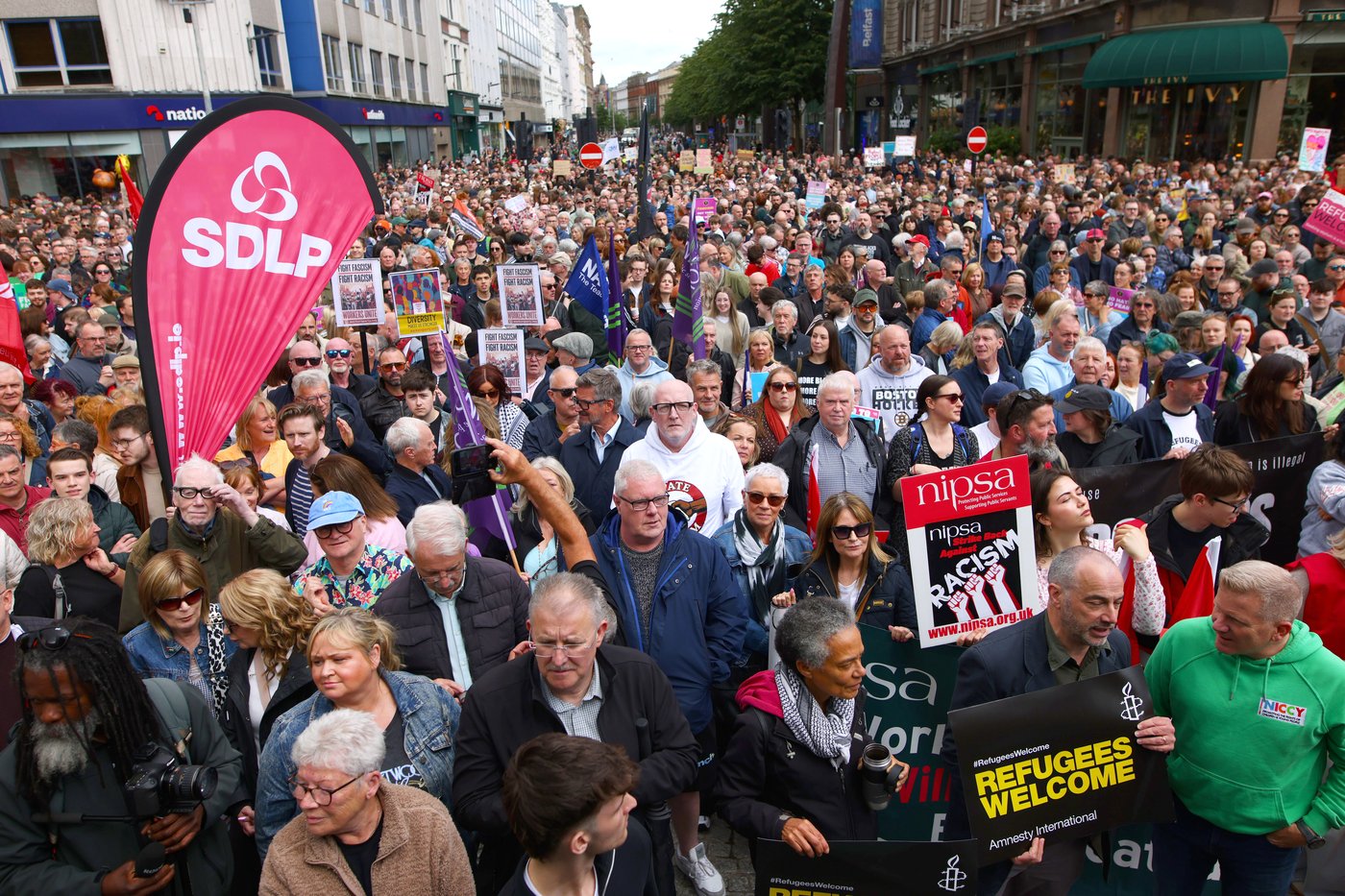 Thousands rally in Belfast to condemn anti-immigrant rioting that followed stabbing | iNFOnews.ca Thousands rally in Belfast to condemn anti-immigrant rioting that followed stabbing | iNFOnews.ca