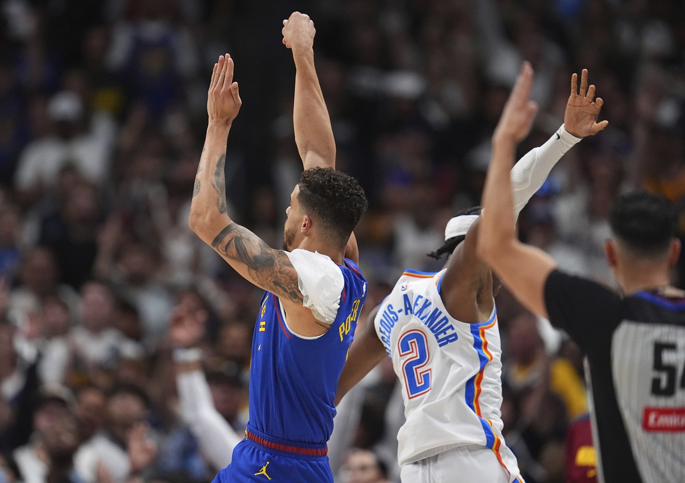 Michael Porter Jr. coming up big for the Nuggets as he plays through pain of sprained left shoulder | iNFOnews.ca