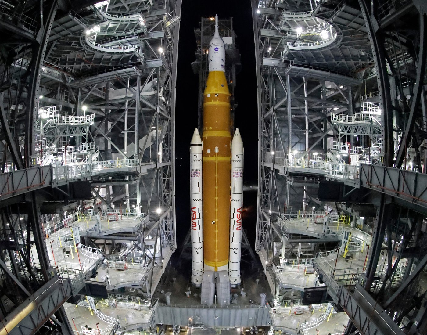 NASA hauls its repaired moon rocket from the hangar back to the pad for an early April launch | iNFOnews.ca