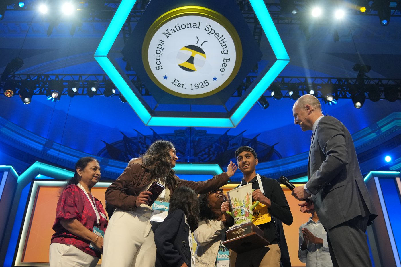 Photos of students competing for the Scripps National Spelling Bee trophy | iNFOnews.ca