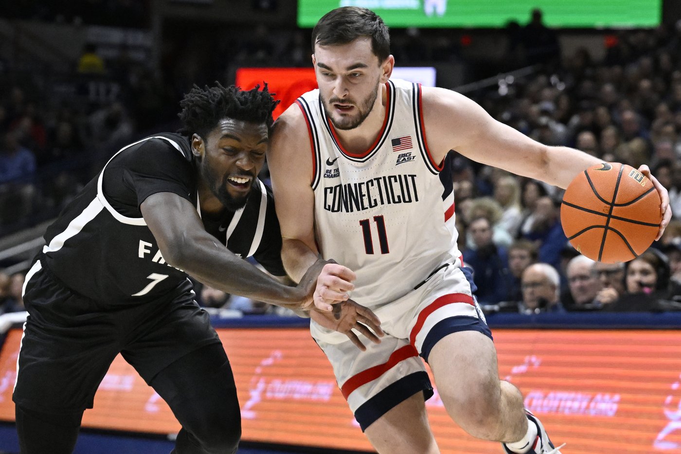 No. 11 UConn erases a 14-point deficit to top Providence 87-84 and stay unbeaten in the Big East | iNFOnews.ca No. 11 UConn erases a 14-point deficit to top Providence 87-84 and stay unbeaten in the Big East | iNFOnews.ca