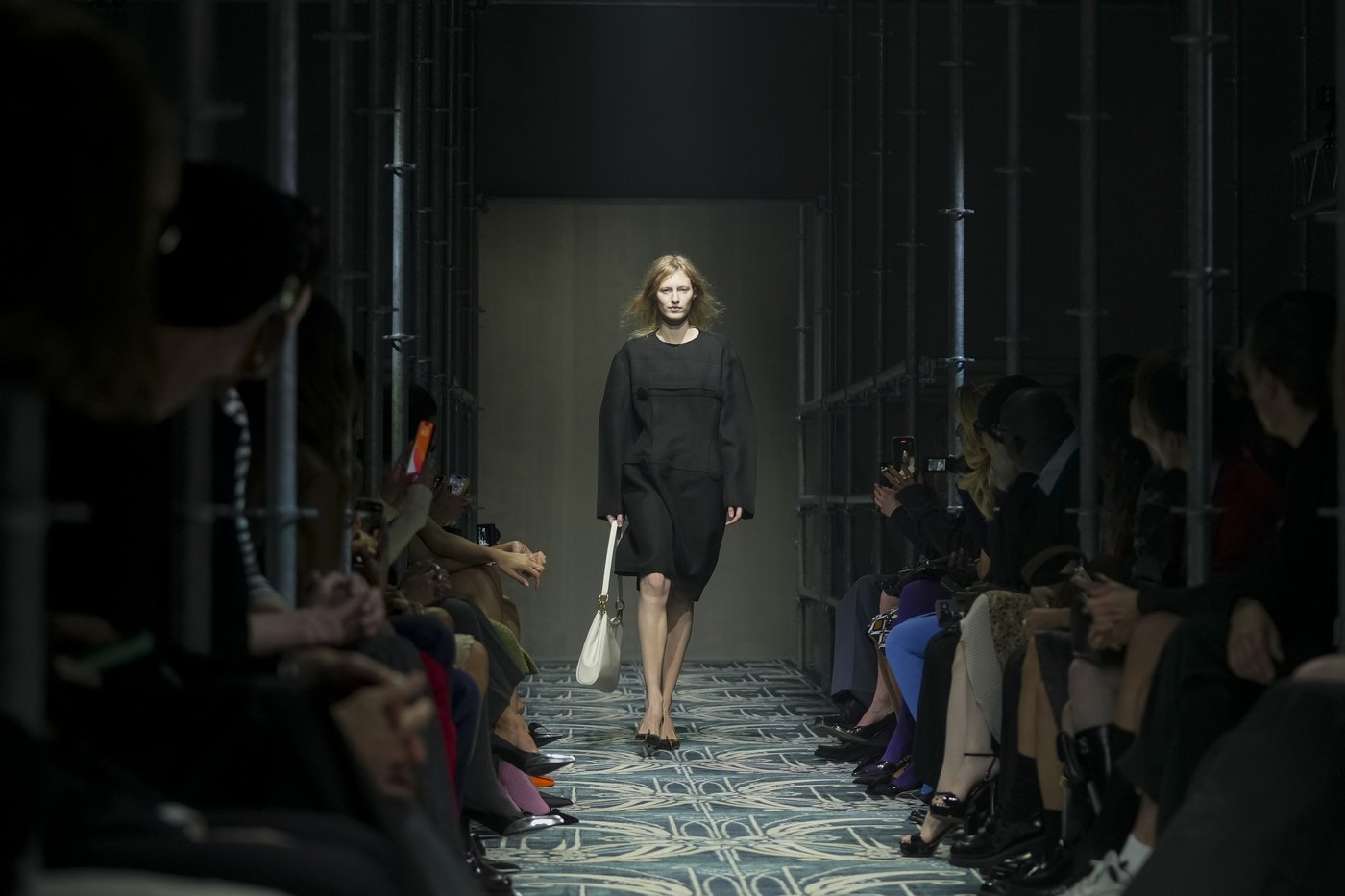 Prada reconstructs femininity starting with the little black dress fit to dark times | iNFOnews.ca